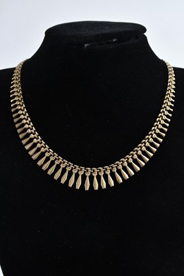 Lot 371 - A 9ct yellow gold Cleopatra style fringe...