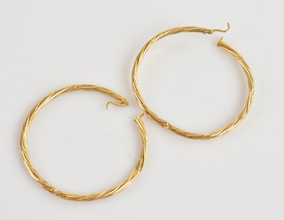 Lot 275 - A pair of 9ct yellow gold hoop twist earrings,...