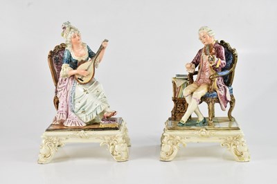 Lot 1394 - ROYAL DUX BOHEMIA; a pair of unusual ceramic...