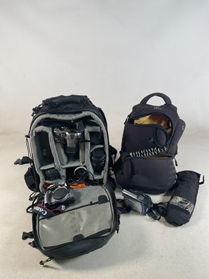 Lot 372 - Two photographer's backpacks with cameras and...