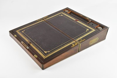 Lot 1379 - A Victorian brass bound rosewood writing slope...