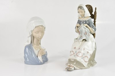 Lot 217 - LLADRÓ; a ceramic model of a maiden knitting,...
