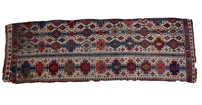 Lot 1215 - A half section from a large Kelim rug, with...