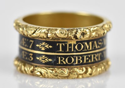 Lot 605 - A 19th century yellow metal and enamel...
