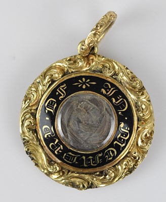 Lot 354 - A 19th century yellow metal and black enamel...