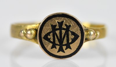 Lot 604 - A 19th century yellow metal mourning ring,...