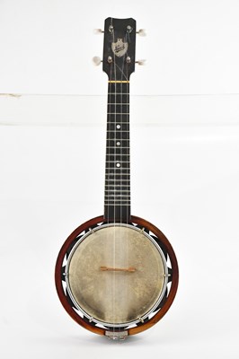 Lot 1783 - KEECH; a cased banjolele.
