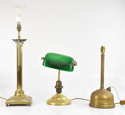 Lot 1317 - A decorative brass Corinthian column table...