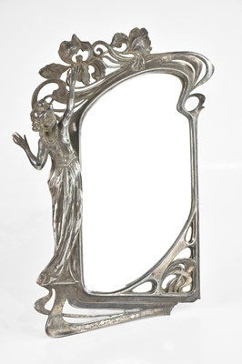 Lot 139 - WMF; an Art Nouveau pewter easel back dressing...