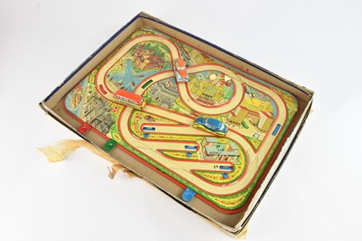 Lot 671 - A vintage tinplate traffic control game.