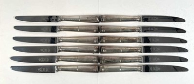 Lot 569 - CARRINGTON & CO; a set of twelve silver sheath...