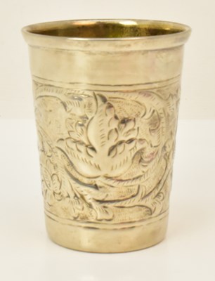 Lot 1004 - A Russian silver plated beaker with floral...