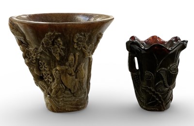 Lot 1067 - A Chinese carved buffalo horn libation cup,...