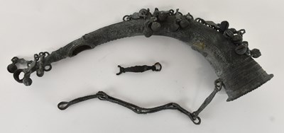Lot 1068 - An Indian patinated bronze tutari, possibly...