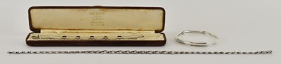 Lot 1490 - An Elizabeth II hallmarked silver twist bangle,...