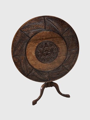 Lot 1135 - A George III carved oak circular occasional...