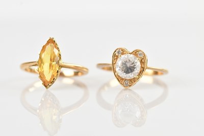 Lot 620 - Two yellow metal dress rings comprising an...