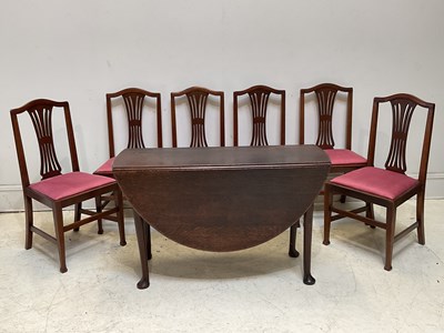 Lot 1106 - An 18th century oak drop-leaf dining table...