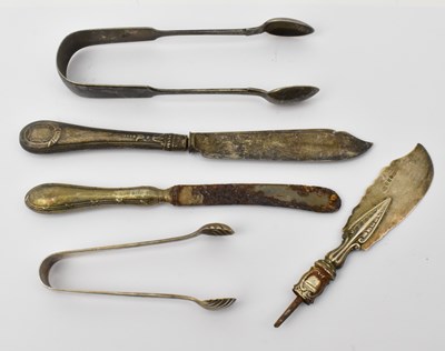 Lot 1098 - Two pairs of hallmarked silver tongs, one for...