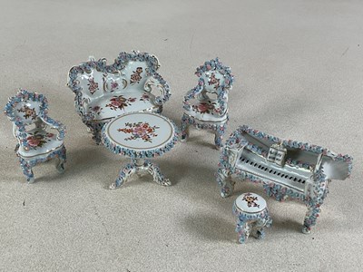 Lot 244 - An early 20th century German floral encrusted...