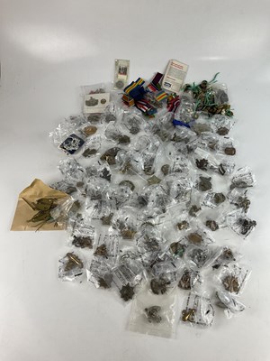 Lot 539 - A large collection of military cap badges,...