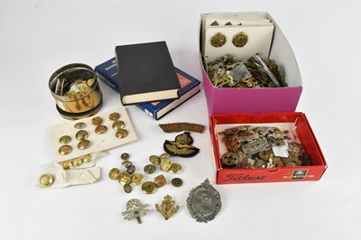 Lot 562 - A large collection of assorted cap badges,...