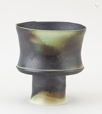 Lot 637 - STEVEN GEDDES; a large porcelain pedestal cup...