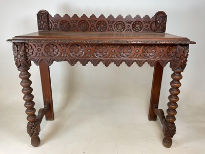 Lot 715 - A carved Victorian hall table, height 92cm,...