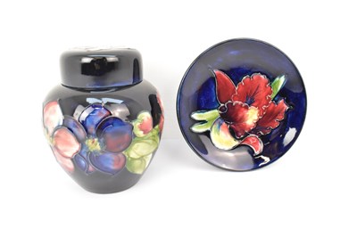 Lot 638 - MOORCROFT; two items of pottery comprising a...