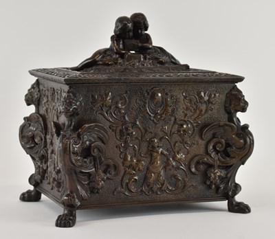 Lot 684 - A late 19th century bronze casket, with wood...