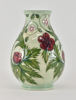 Lot 625 - MOORCROFT; an art pottery baluster form vase,...