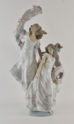 Lot 657 - LLADRÓ; a large porcelain figure group of two...