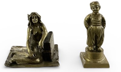 Lot 702 - A small early 20th century bronze figure of a...