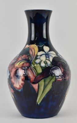 Lot 573 - MOORCROFT; an early to mid 20th century bottle...