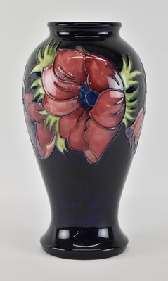 Lot 606 - MOORCROFT; an art pottery ovoid form vase,...