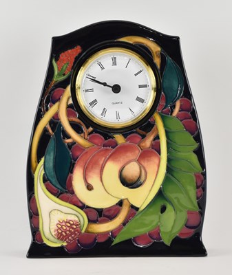 Lot 595 - EMMA BOSSONS FOR MOORCROFT; an art pottery...