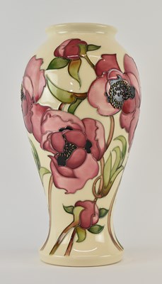 Lot 569 - MOORCROFT; a 'Calamine Cream' pattern baluster...