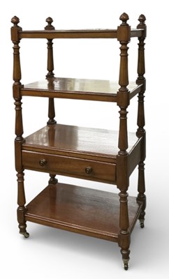 Lot 43 - A Victorian mahogany four tiered single drawer...