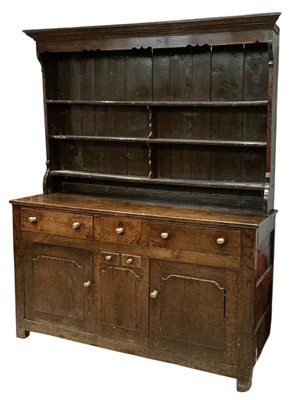 Lot 16 - An early to mid 19th century oak Welsh dresser,...