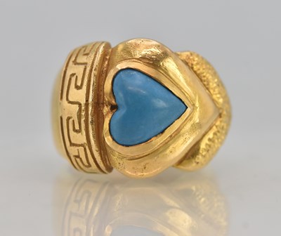Lot 1189 - An 18ct yellow gold chunky dress ring, set...