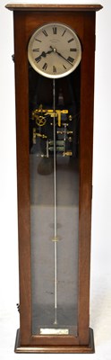 Lot 106 - SYNCHRONOME; a mahogany-effect cased electric...