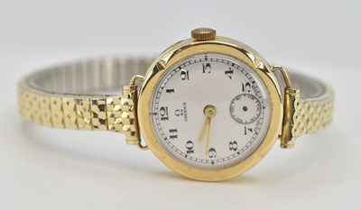 Lot 1650 - OMEGA; a lady's 9ct yellow gold wristwatch,...