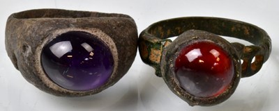 Lot 795 - Two Roman rings, one set with an oval amethyst...