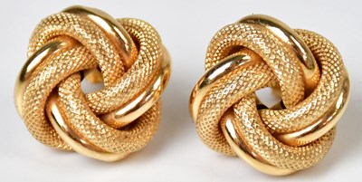 Lot 834 - A pair of 9ct yellow gold textured knot-shaped...
