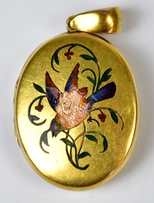 Lot 822 - A yellow metal oval locket pendant with...