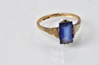 Lot 790 - A 9ct yellow gold ring set with a sapphire,...