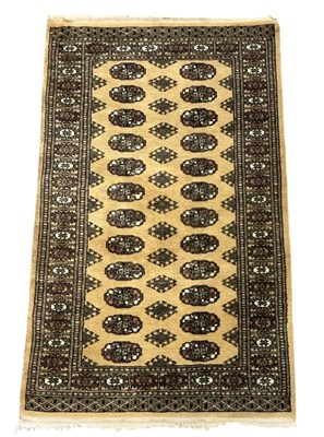 Lot 105 - An Iranian wool pile hand woven Bokhara Deluxe...