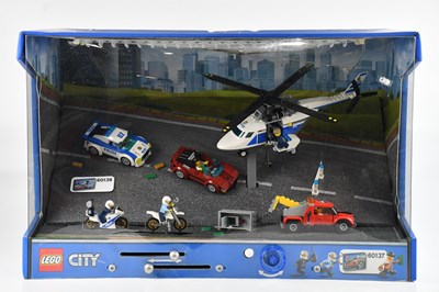 Lot 596 - LEGO CITY POLICE; a shop display, set numbers...