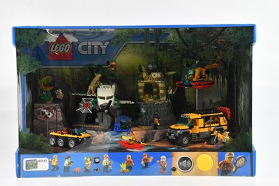 Lot 588 - LEGO EXPLORERS; a shop display, set numbers...