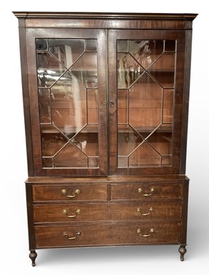 Lot 8 - An early 19th century mahogany bookcase, with...